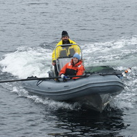 Researchers returning from photographing and tagging humpback whales